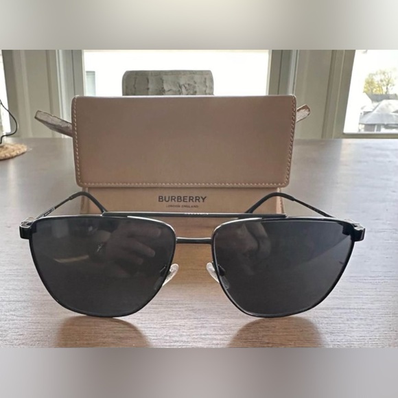 Burberry Sunglasses.Barely worn like New.